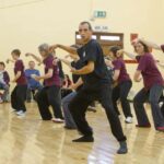Tai chi class in hall