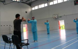 Wang practicing Tai Chi in Hall
